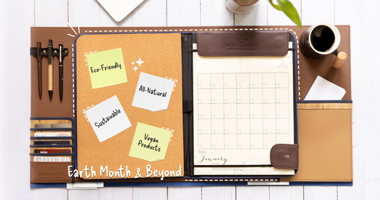 A vegan leather clipboard planner that shows sticky notes with Earth Day reminders.
