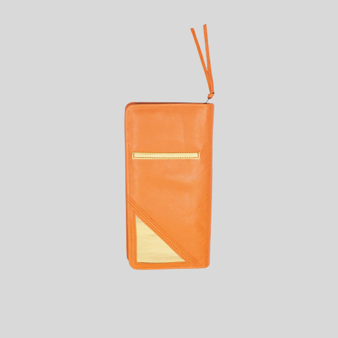 The backside of a orange vegan leather wallet.
