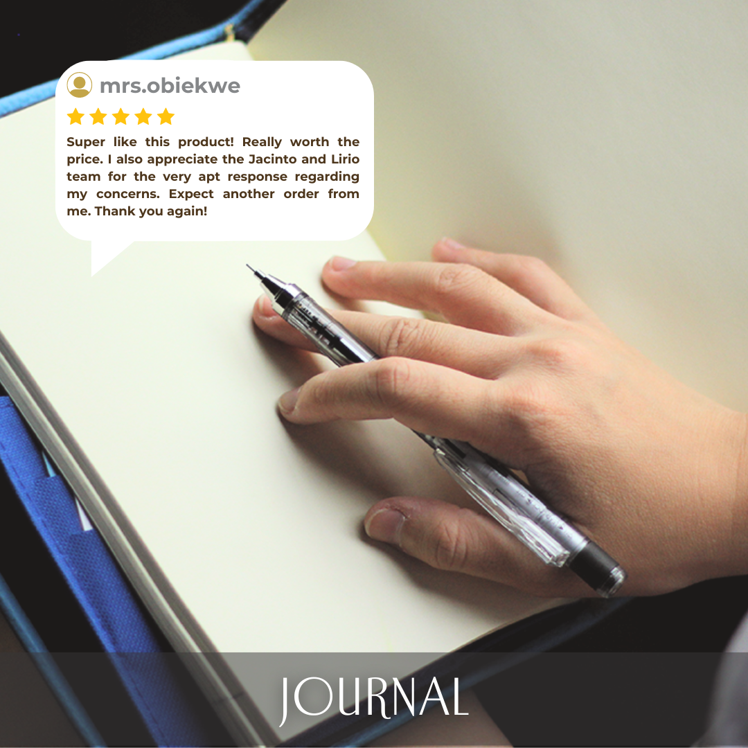 A five star review on a blue leather journal with blank pages.