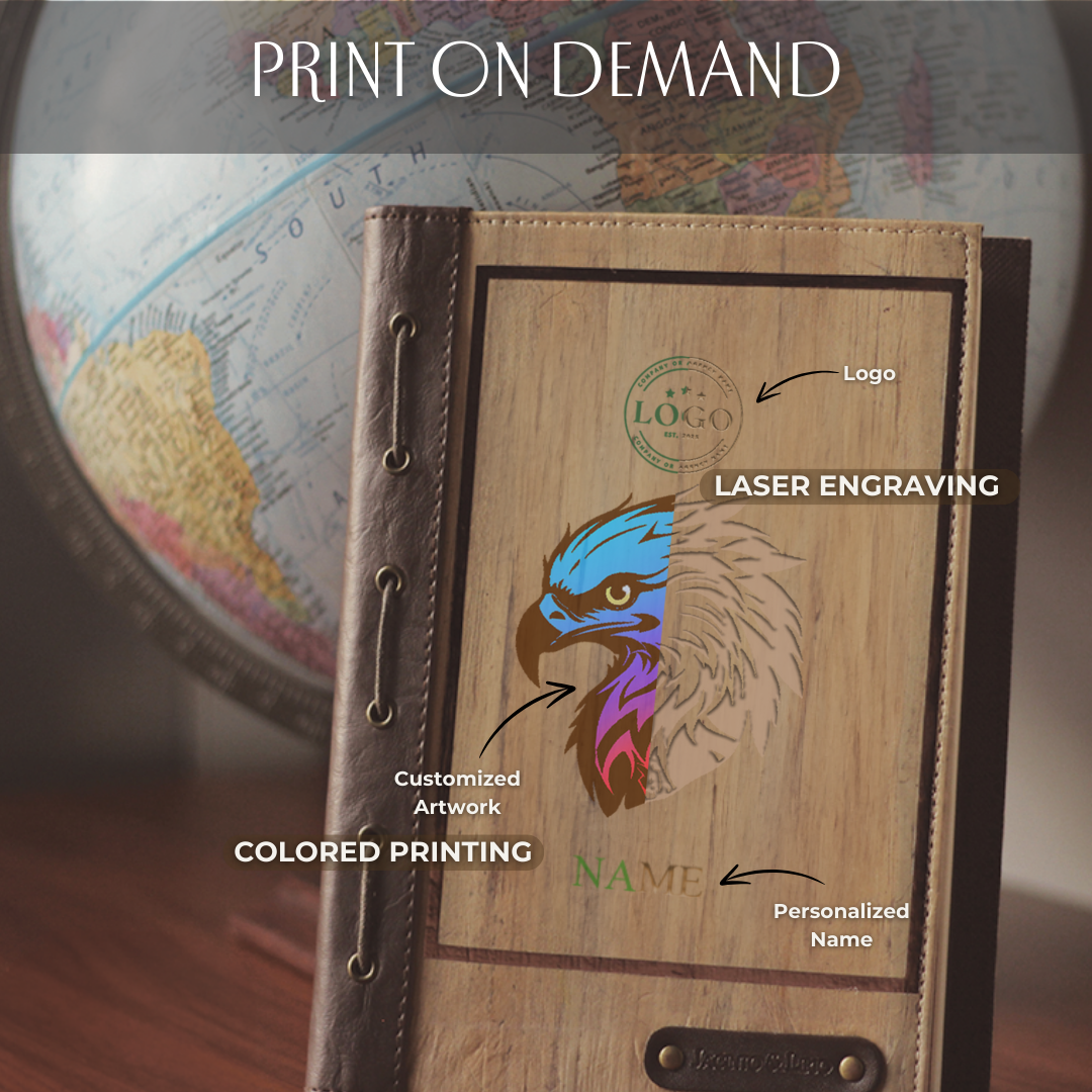 A vegan leather journal with a colorful eagle laser printed on its cover.