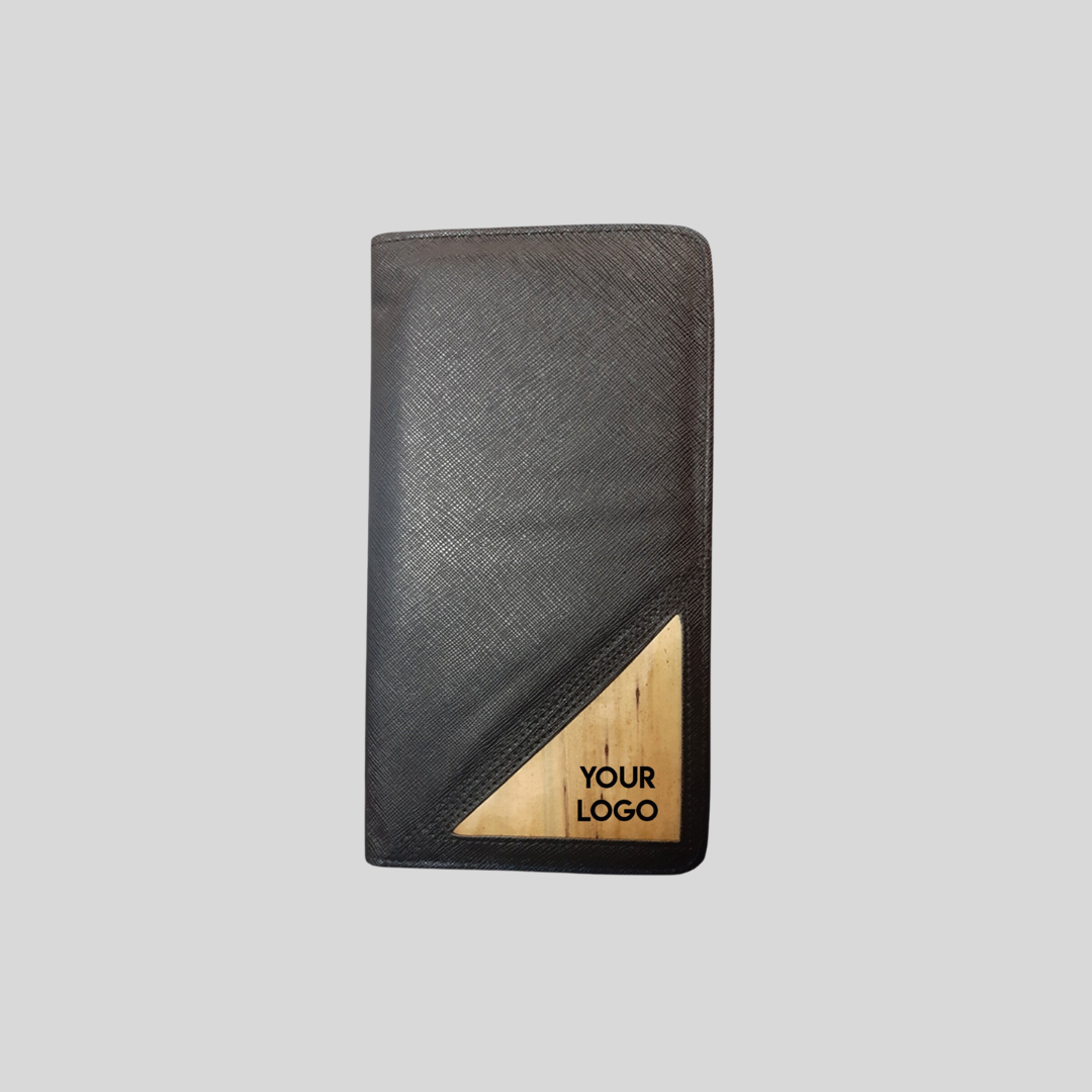 A black vegan leather rectangular wallet, with an accent corner of water hyacinth vegan leather that looks like wood.
