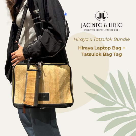 A Tatsulok vegan leather bag tag in ash-grey plain hanging on a 13" Hiraya laptop bag in black.