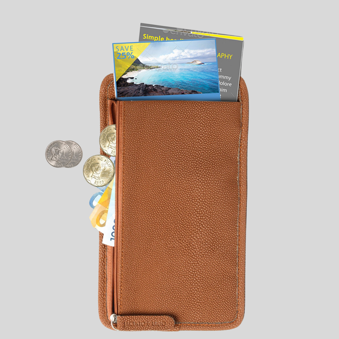 A brown vegan leather wallet has coins, bills, and cards spilling out of it from multiple different compartments.
