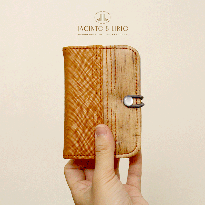 A GIF showing the various features of the vegan leather Pitaka wallet, such as having multiple card holders, ID and picture holder, and card slots.