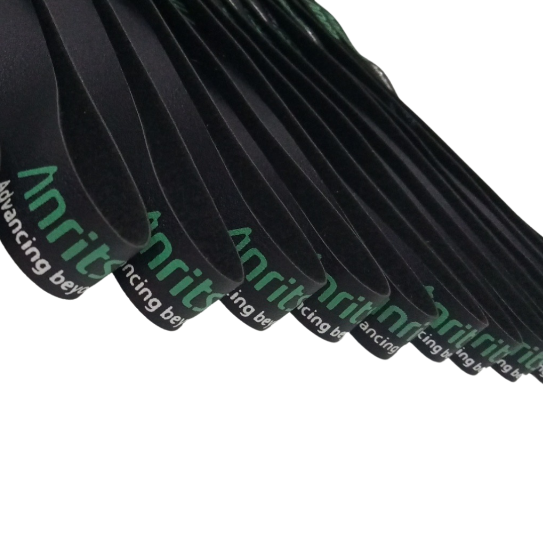 Stack of black Anritsu neck lanyards, showcasing the green Anritsu "Advancing Beyond" branding. Perfect for ID badges, trade shows, and corporate giveaways.