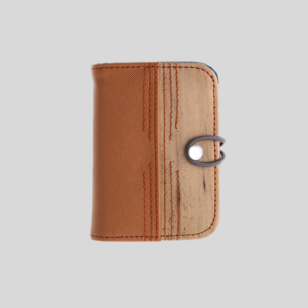 A two-toned brown vegan leather mini card wallet.