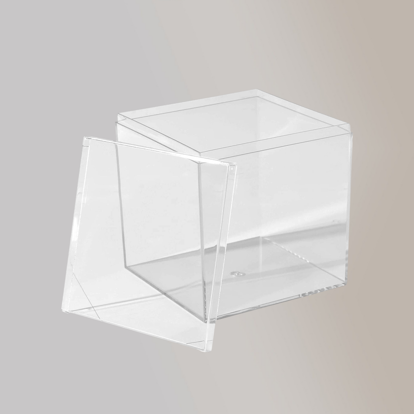 Clear, transparent square acrylic box with its lid.