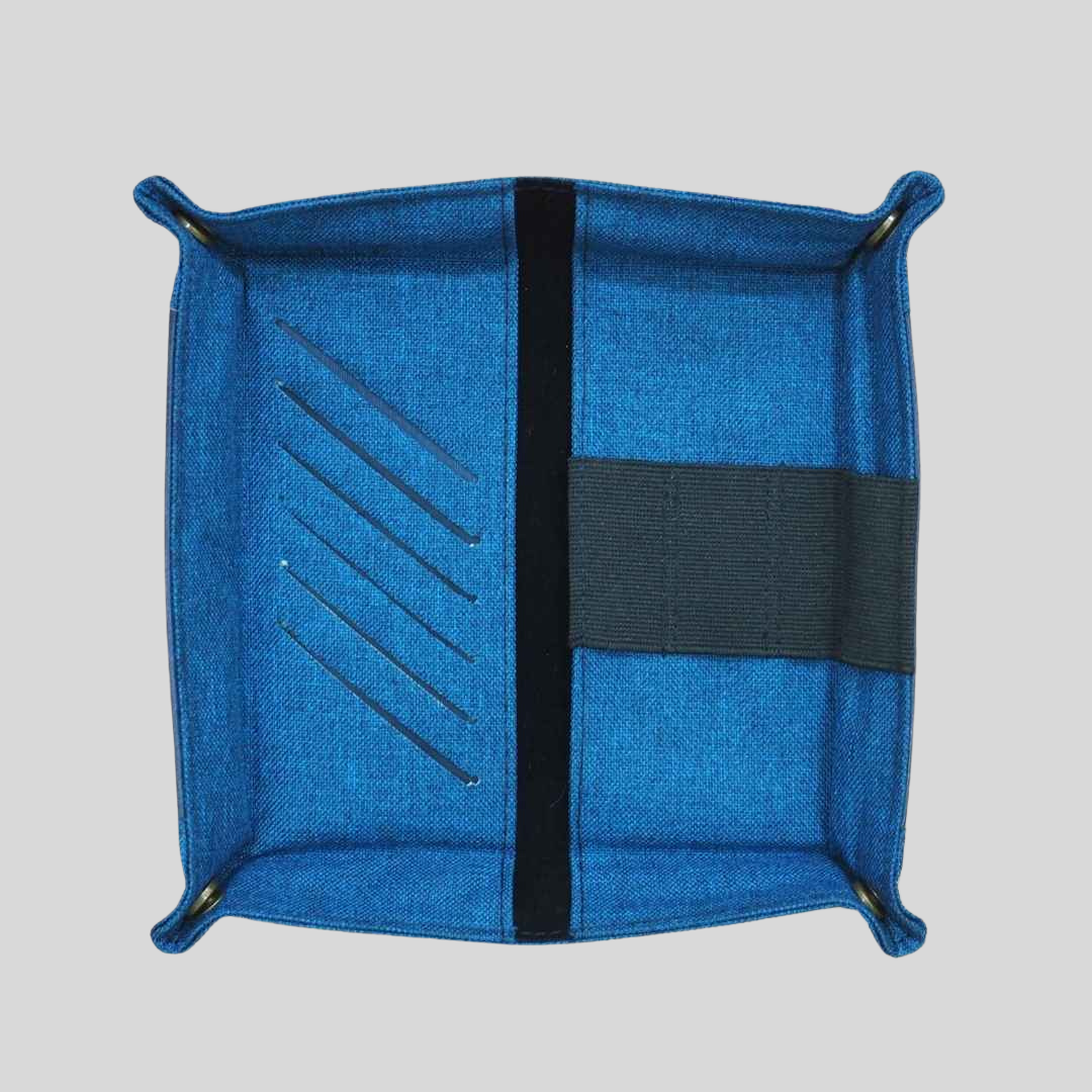 A blue vegan leather tray that is square-shaped and has pinched corners.