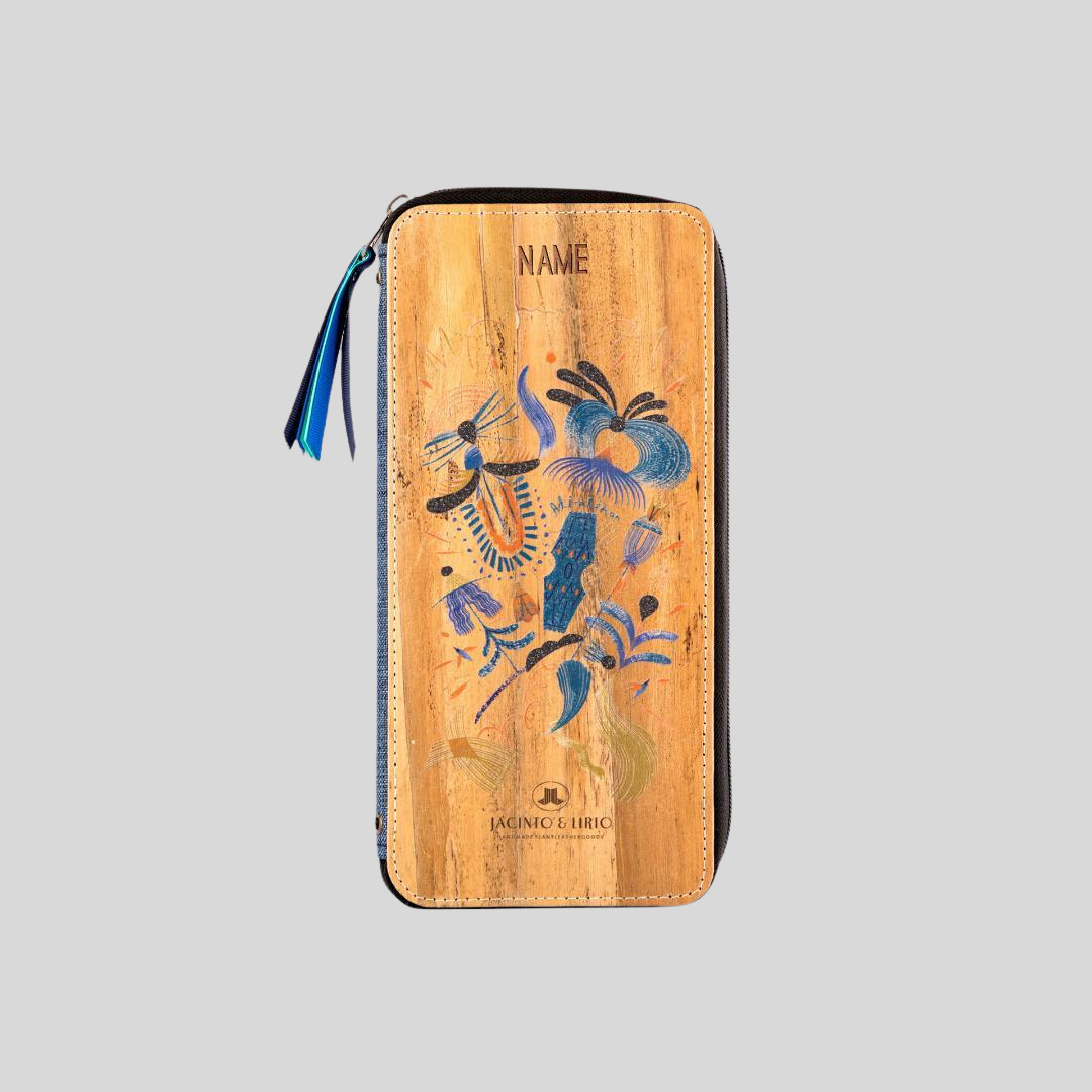 A wood-colored vegan elather wallet with a blue abstract design on its cover.
