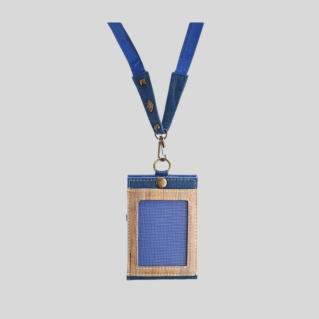 A blue vegan leather ID lanyard with a mesh ID holder and metal hooks