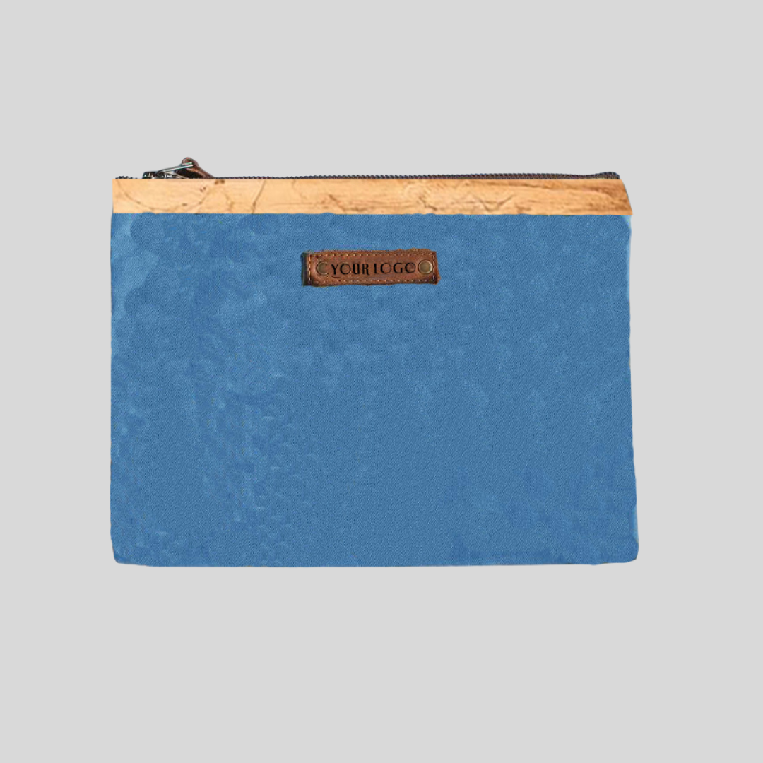 A rectangular pouch made of plain sky blue canvas material and vegan leather on its hem.