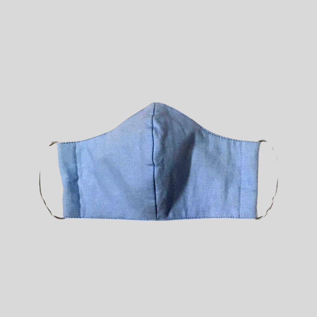 A sky blue colored fabric cloth mask