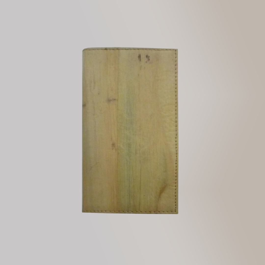 A tall pale birch-colored hotel keycard holder.
