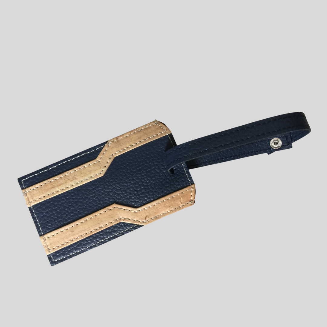 A brown and blue vegan leather luggage tag with a futuristic design.