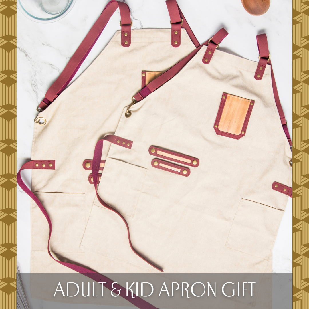 Two matching aprons that come in identical red and cream designs with a vegan leather chest pocket, in a small kid's size and bigger adult size.