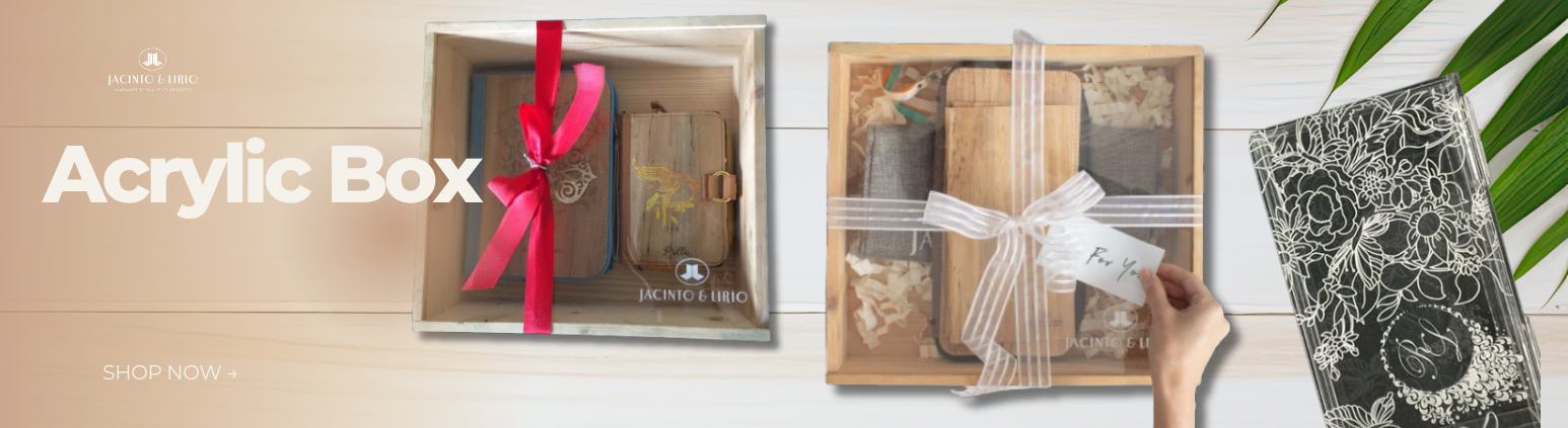 Two acrylic packaging boxes with wooden sides holding journals.