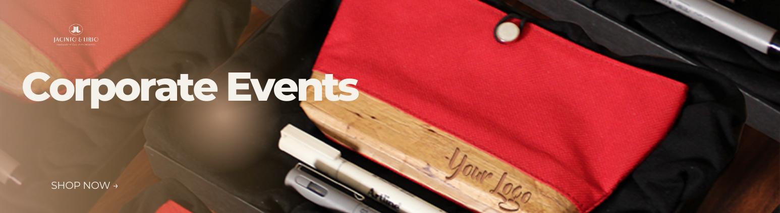 A red purse with a brown bottom inside of a black box.