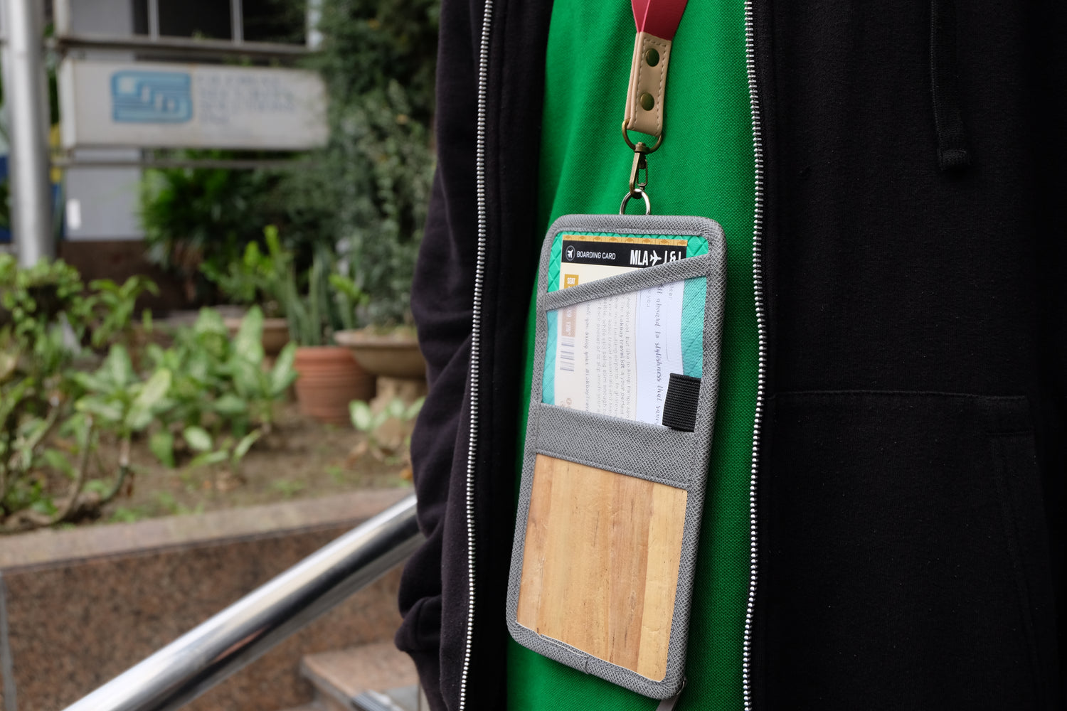 Lakbay serves as a travel neck wallet with a D-ring to easily attach lanyards.