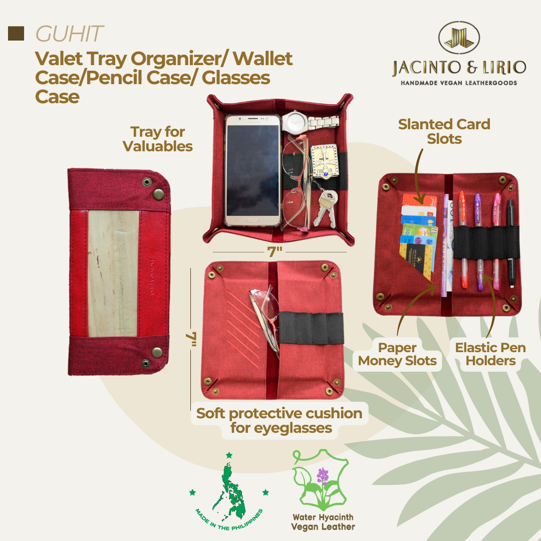 A multi-use and foldable red vegan leather valet tray.