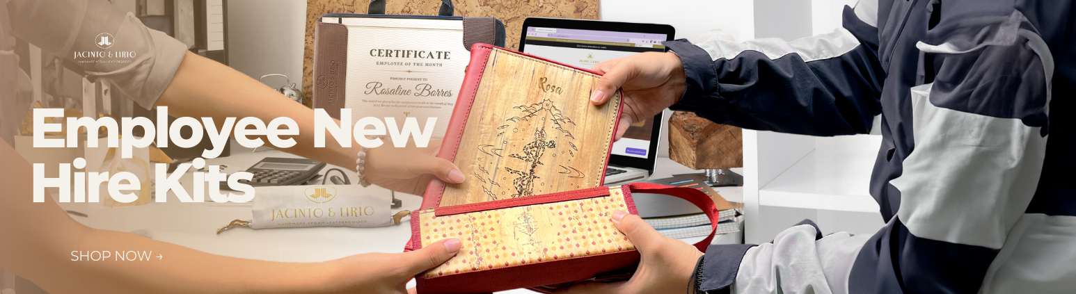 Two people exchanging a red notebook and red pencil case.