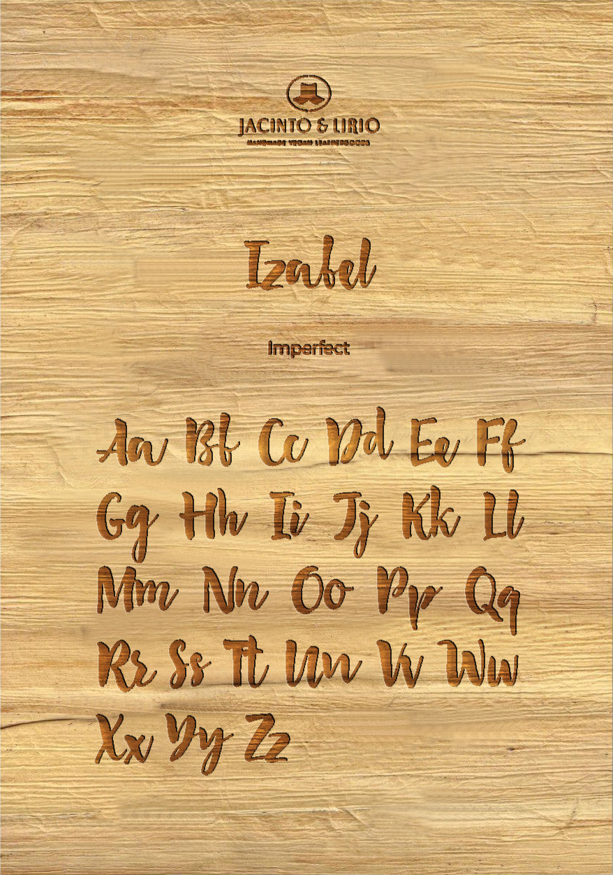 The name "Izabel" laser engraved on a piece of vegan leather along with its the uppercase and lowercase alphabet engraved with the same font to showcase the full range.