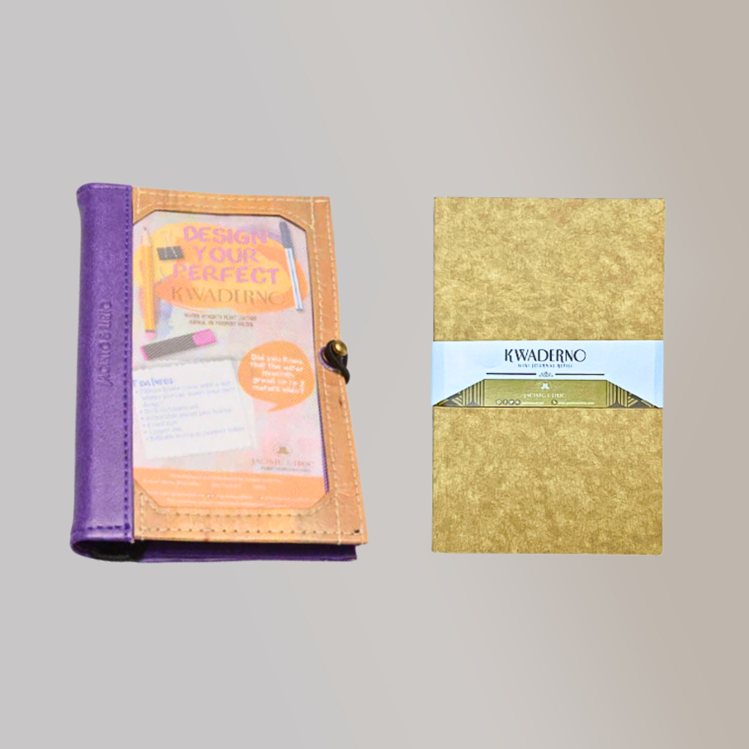 A vegan leather notebook holder laying beside its notebook refills.