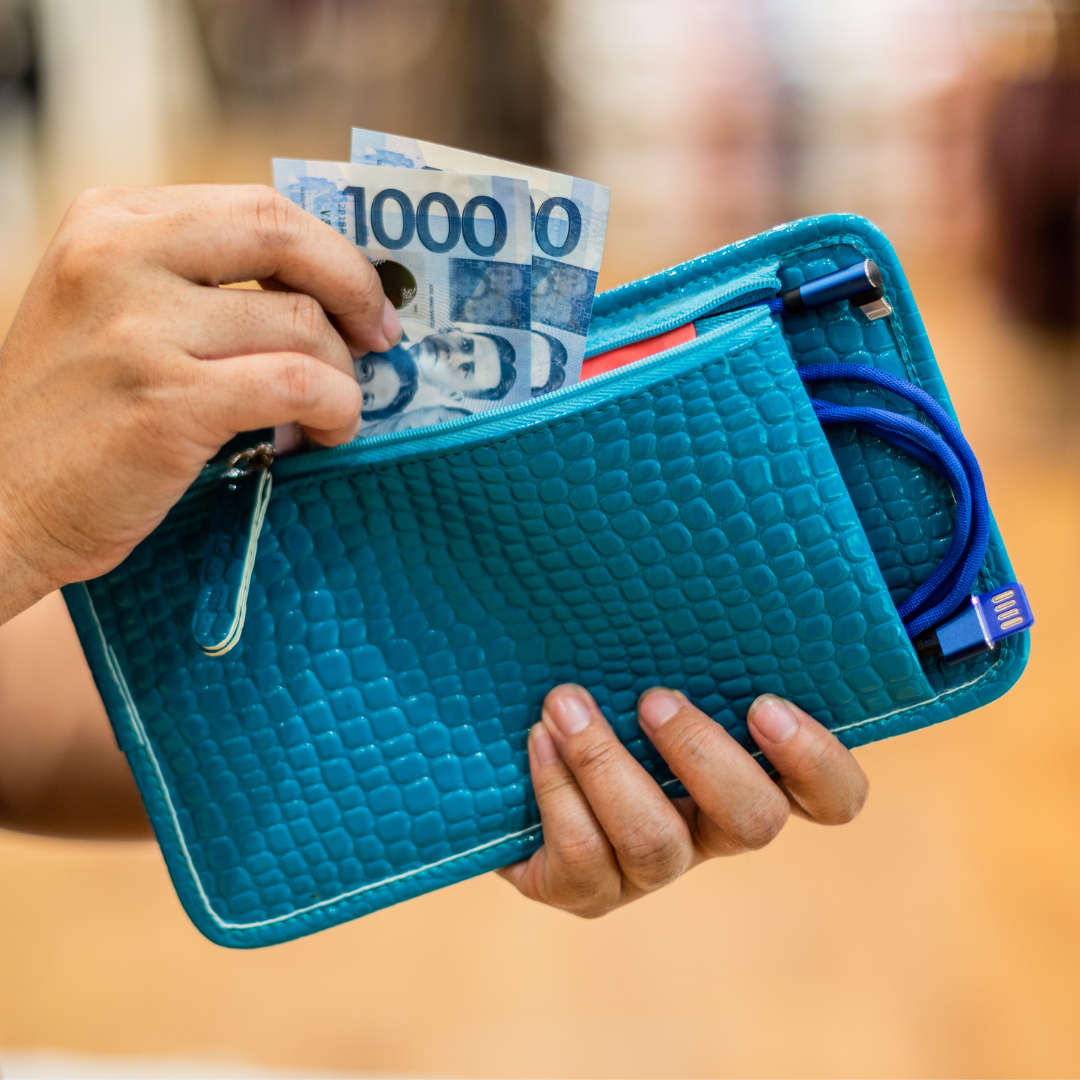 Lakbay wallet pouch has zippered back pocket to hold bills, notes, and other essentials.