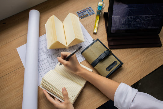 Vegan Leather Journal Pacem II placed on top of a work desk.