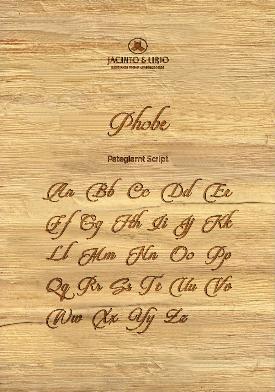 The name "Phobe" laser engraved on a piece of vegan leather along with its the uppercase and lowercase alphabet engraved with the same font to showcase the full range.