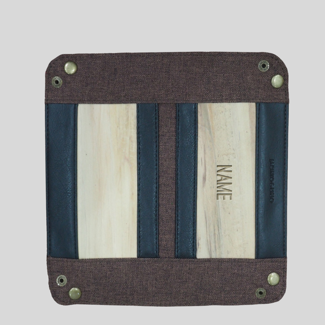 A foldable square tray that is laid flat but whose corners can be pinned together to create a bowl shape.