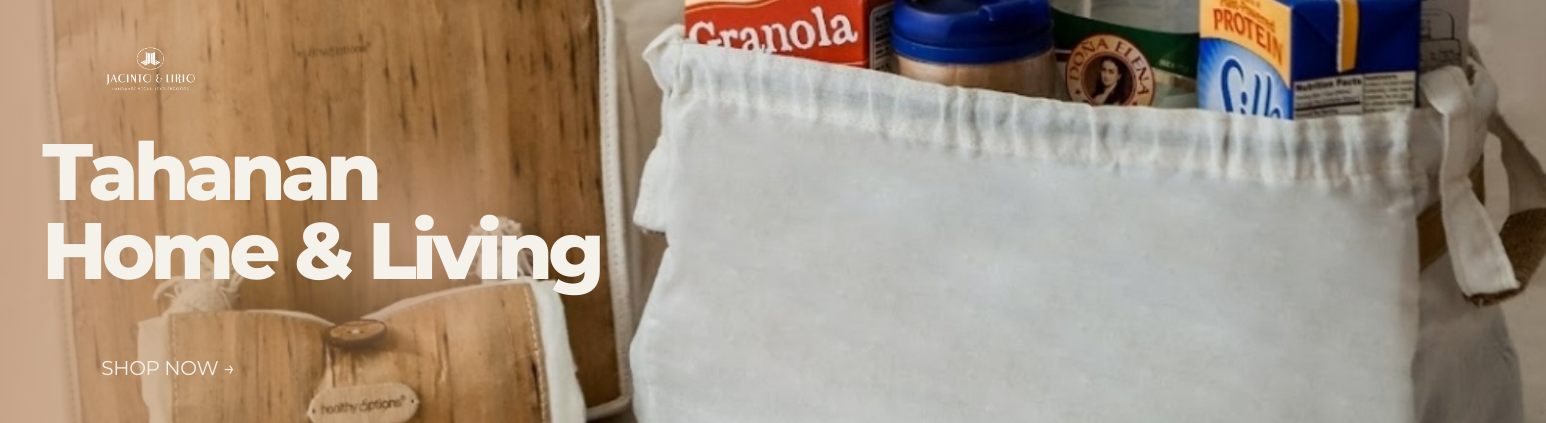 A bunch of grocery products sitting inside an open white tote bag.