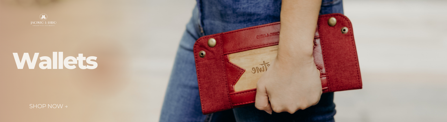 A person holding a folded up valet tray that is red.