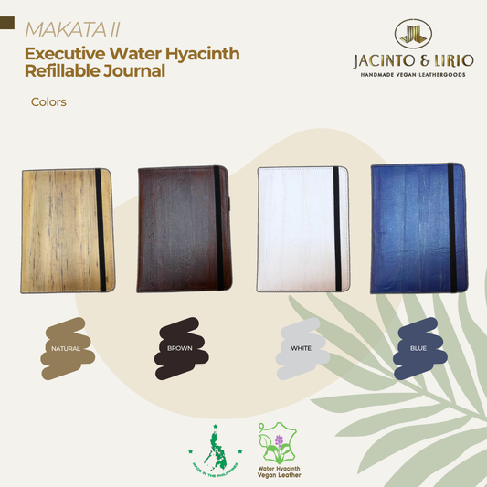 Four different color variations of a vegan leather notebook with a black strap closure.