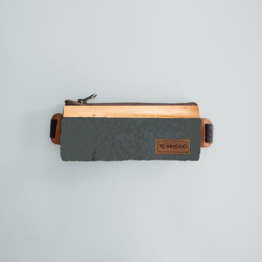 A plain gray rectangular pencil case made out of vegan leather.
