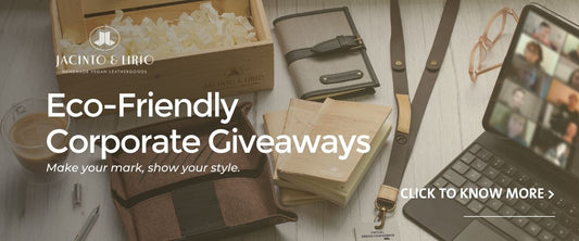 A picture of a desktop with various office products made from vegan leather, with the title "Eco-Friendly Corporate Giveaways".