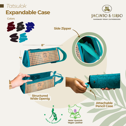 Expandable pencil case with wristlet in turquoise.