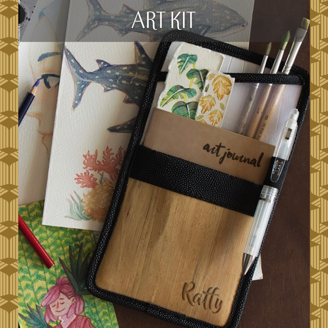 Lakbay wallet in black serves as a mobile art kit with compartments for brushes, pens, pencils, small journals, and papers.