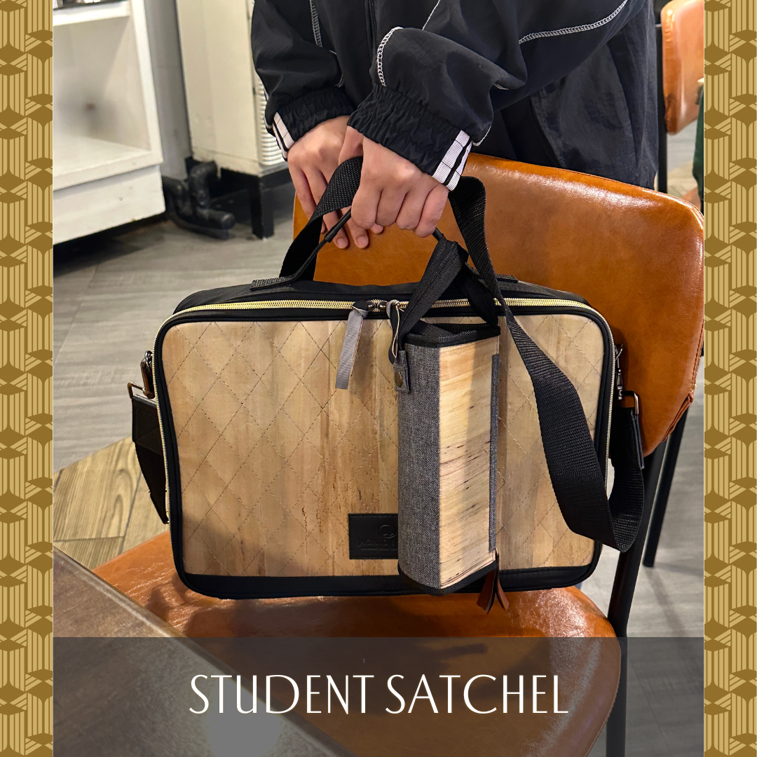 The Hiraya Laptop Bag in 13" Black serves as a student satchel with dedicated compartments for a laptop, documents, pens, pencils, cords, and more.