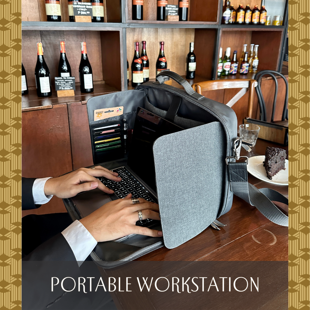 The Hiraya Laptop Bag in 15" Charcoal Grey serves as a portable workstation with dedicated space to open a laptop, card holders, and a built-in laptop stand.