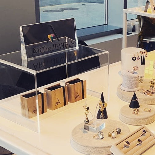 Jacinto & Lirio's Earring Jewelry Box and Necklace Pouch Packaging serves as elegant packages for the Art in Jewels brand.