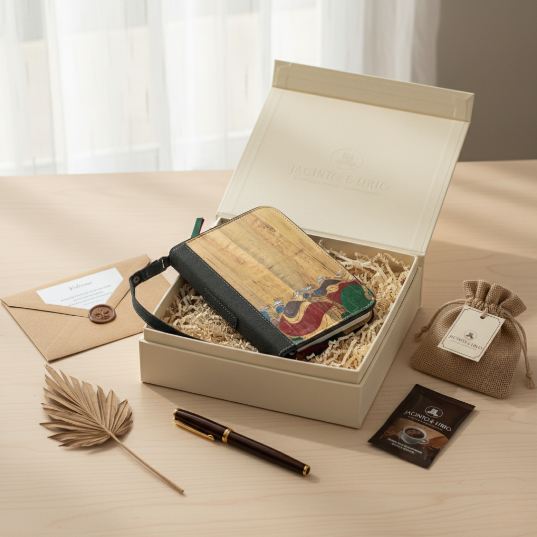Gift set with Gala in a box, surrounded by other items on a table.