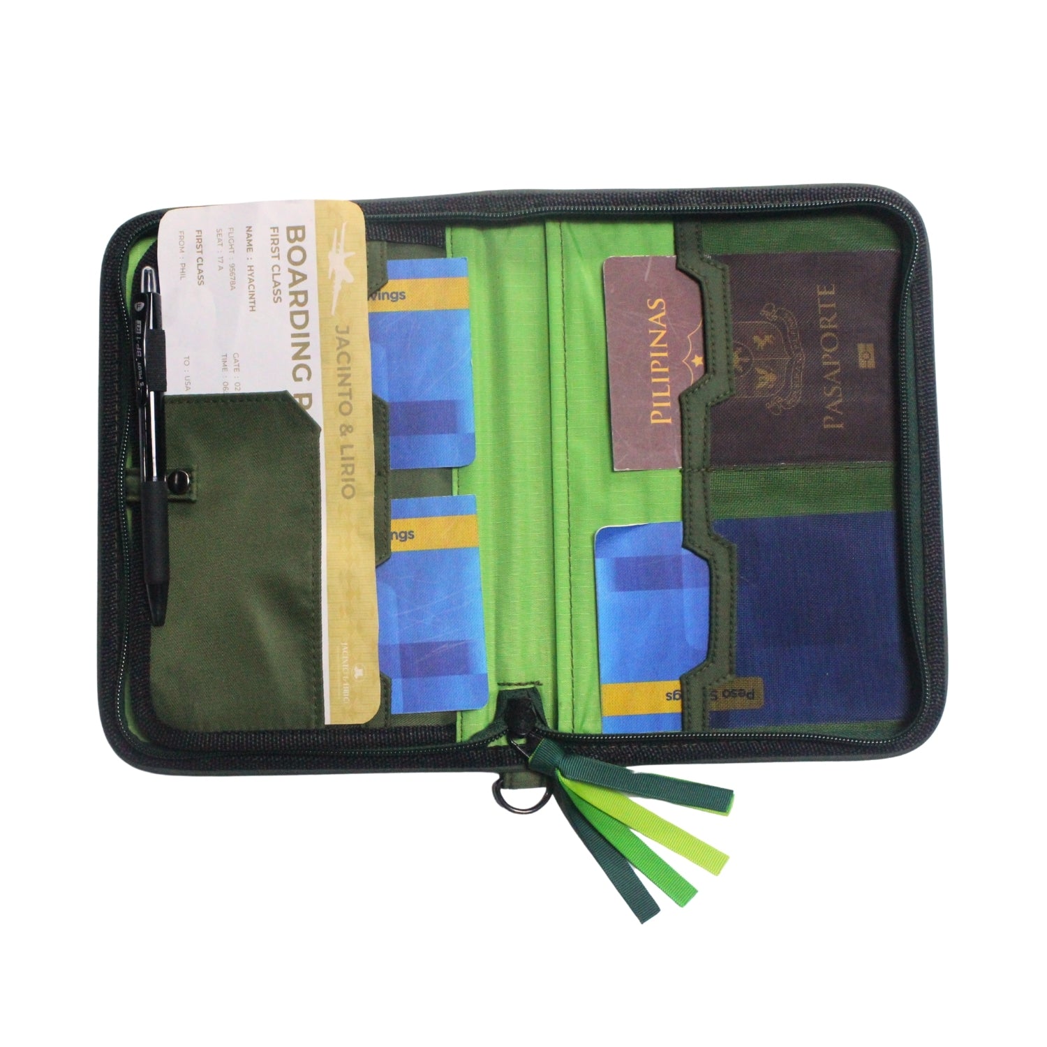 Gala Banaue family passport holder daily planner open with three passbooks, a passport, and a boarding pass inserted.