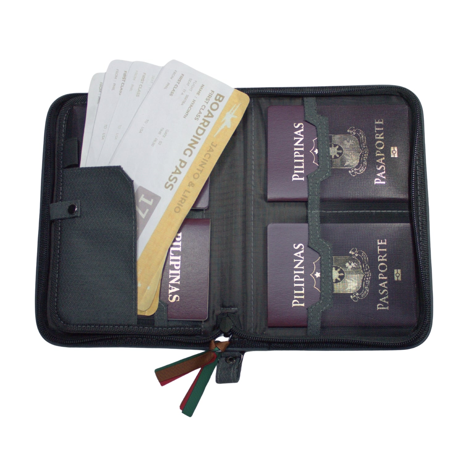 Gala Chocolate Hills family passport holder daily planner open with four passports and four boarding passes inserted.