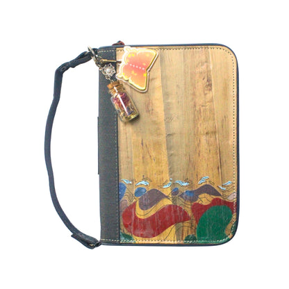 Gala Chocolate Hills family passport holder daily planner front view with trinket attached to D-ring.