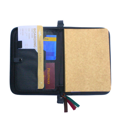 Gala Chocolate Hills family passport holder daily planner open with planner, passport, passbook, and boarding pass inserted.