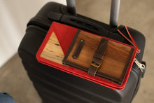 Load image into Gallery viewer, Journal Pacem II on top of a luggage.