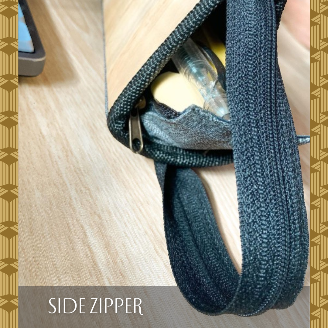 A triangular pencil case that has a side zipper opening.