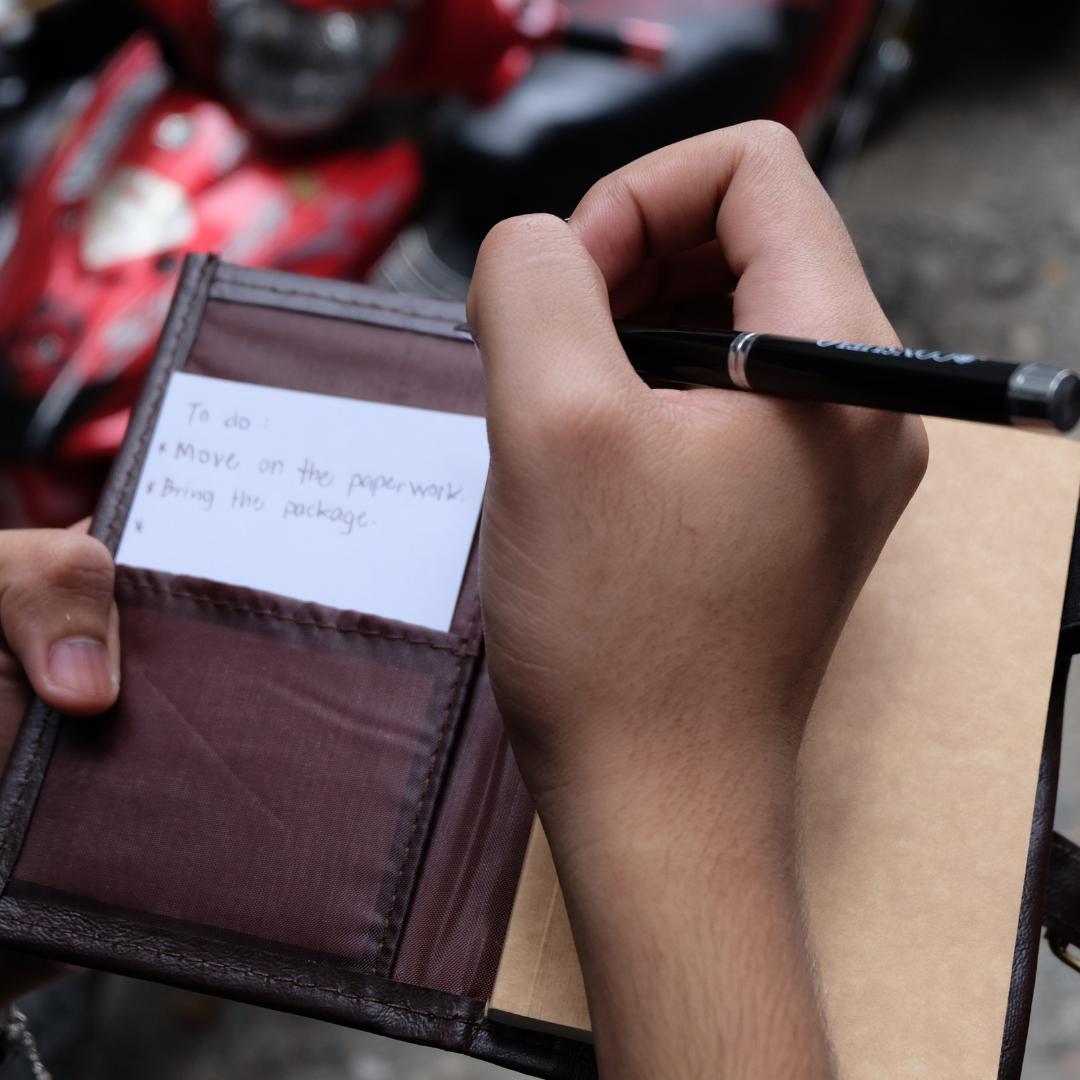 A small notebook that serves as a to-do list.