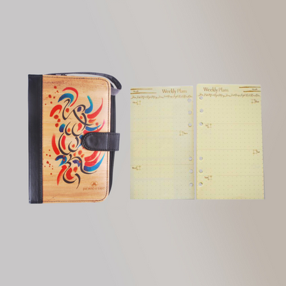 This planner is accented with red, magenta, blue and gold ink. This artwork on a wallet organizer symbolizes Jacinto &amp; Lirio as a socially oriented brand whose goal is to drive change for the better and&nbsp;innovation through sustainable means. Likhain A6 Ring Binder Dateless Monthly and Weekly Planner Wallet Organizer gives you a piece of Philippine folklore while it helps you organize your daily life. 