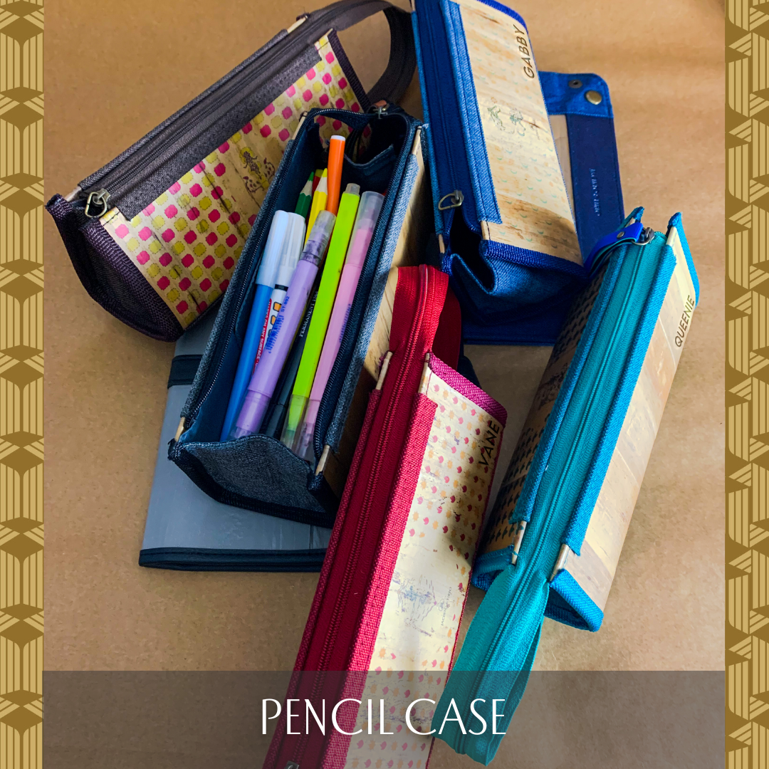 A handful of differently colored pencil cases of the same style.